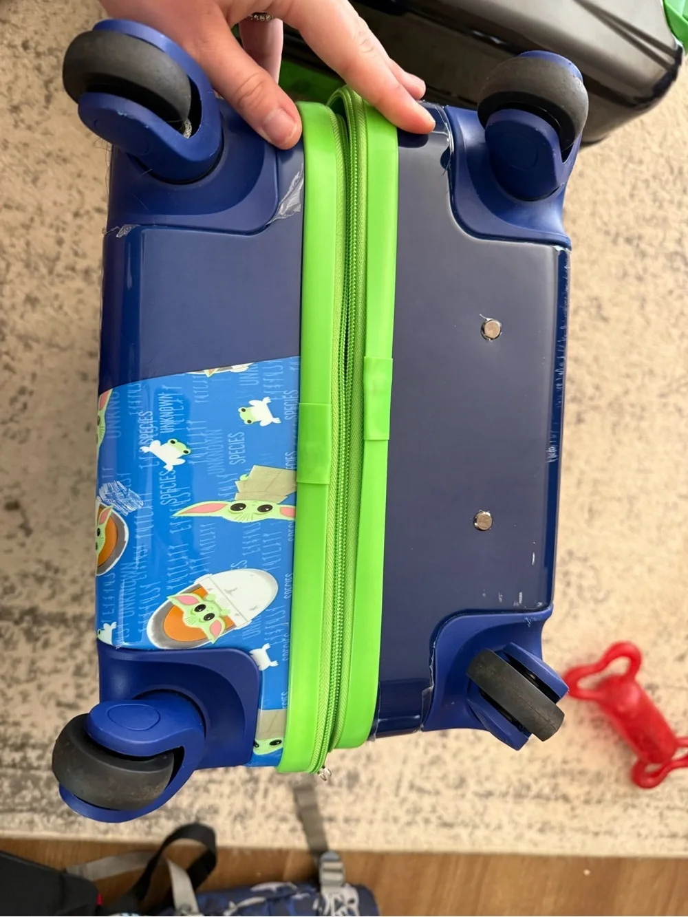 The Childs Grogu Blue Rolling Suitcase for Kids